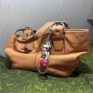 Coach soho tote purse tan black white red cherry trigger snap bag charm